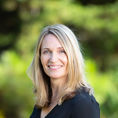 Dental Hygienist Jessie Campbell Smiling Outdoors