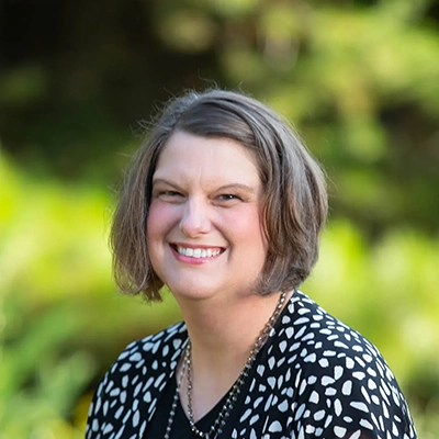 Dental Assistant Julie Elzey Smiling Outdoors