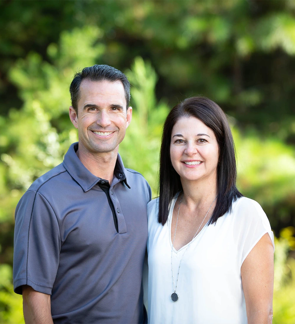 Dentist Sherry Jordan With Husband Outdoors